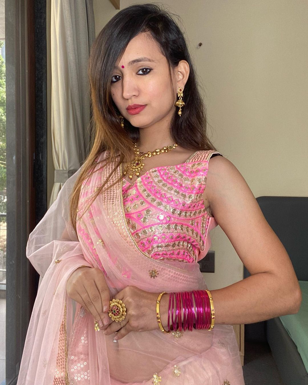 Pink net saree with stitched blouse for wedding ready to wear saree